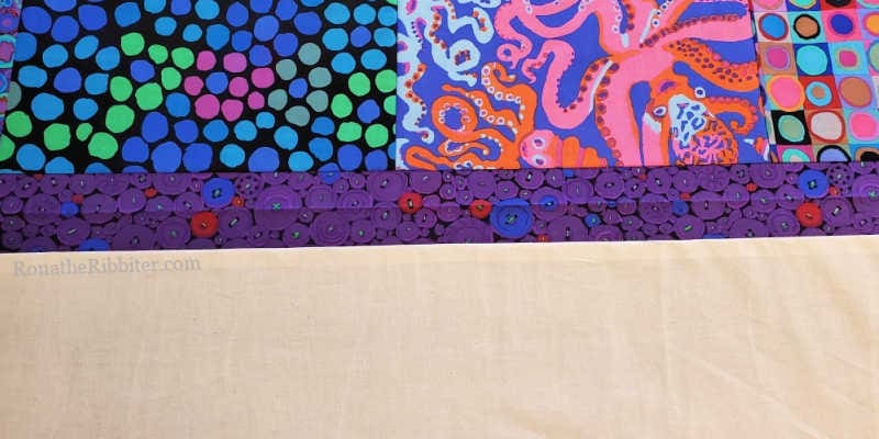 Top and bottom pieces stitched together to make quilted curtains